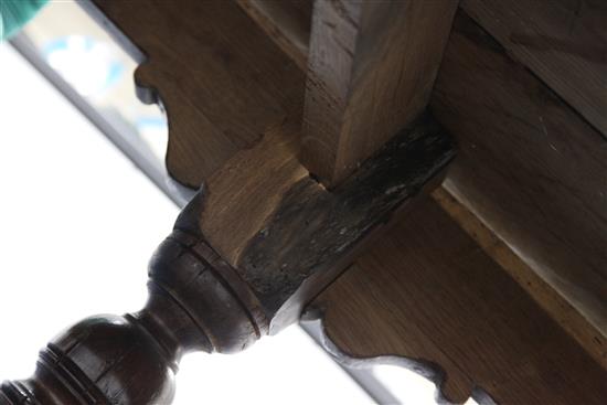 A large carved oak refectory table, 11ft 8in. x 2ft 11.5in. x 2ft 6.5in.